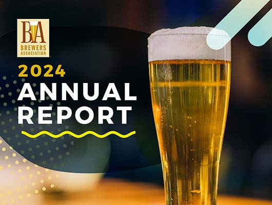 Pilsner glass with text 2024 Annual Report