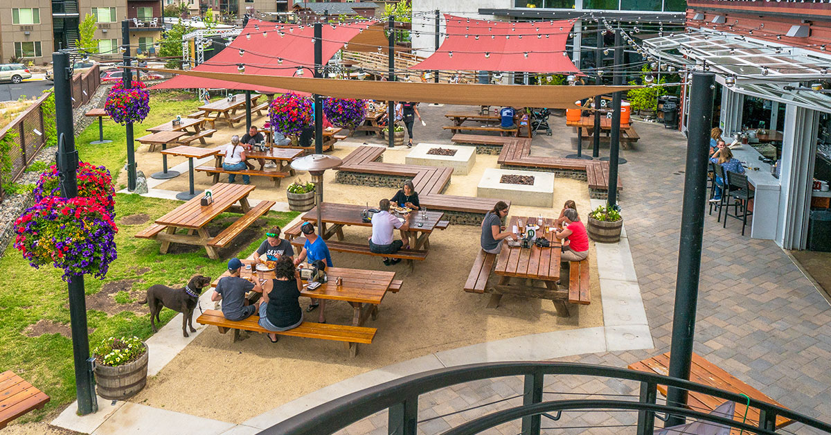 beer drinkers enjoying patio at brewery 1200x628 1