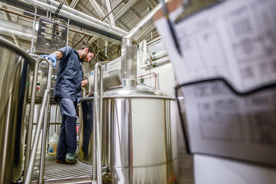 brewer at brew kettle