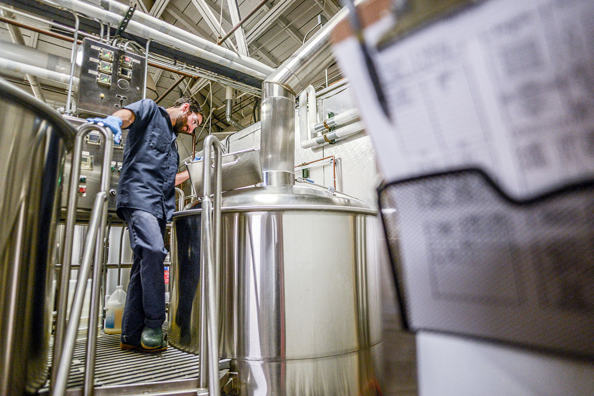 brewer at brew kettle