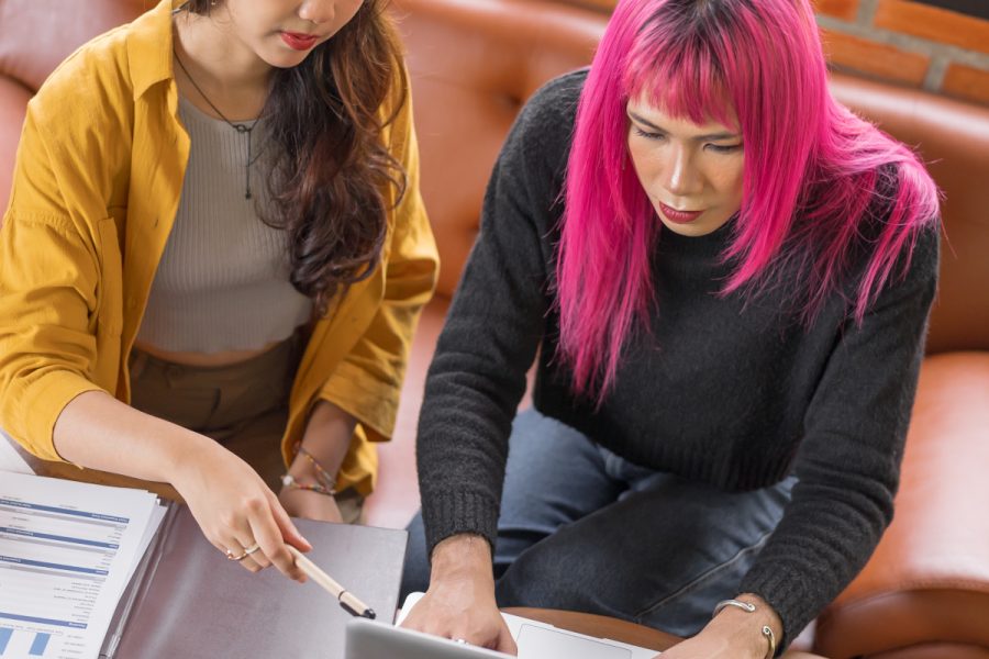 two people working on a computer