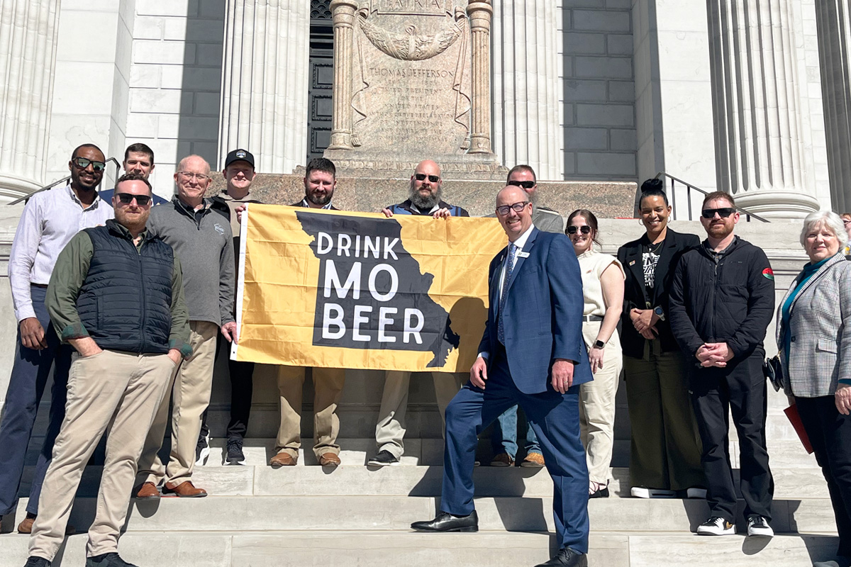 craft beer advocates posing on state capitol steps