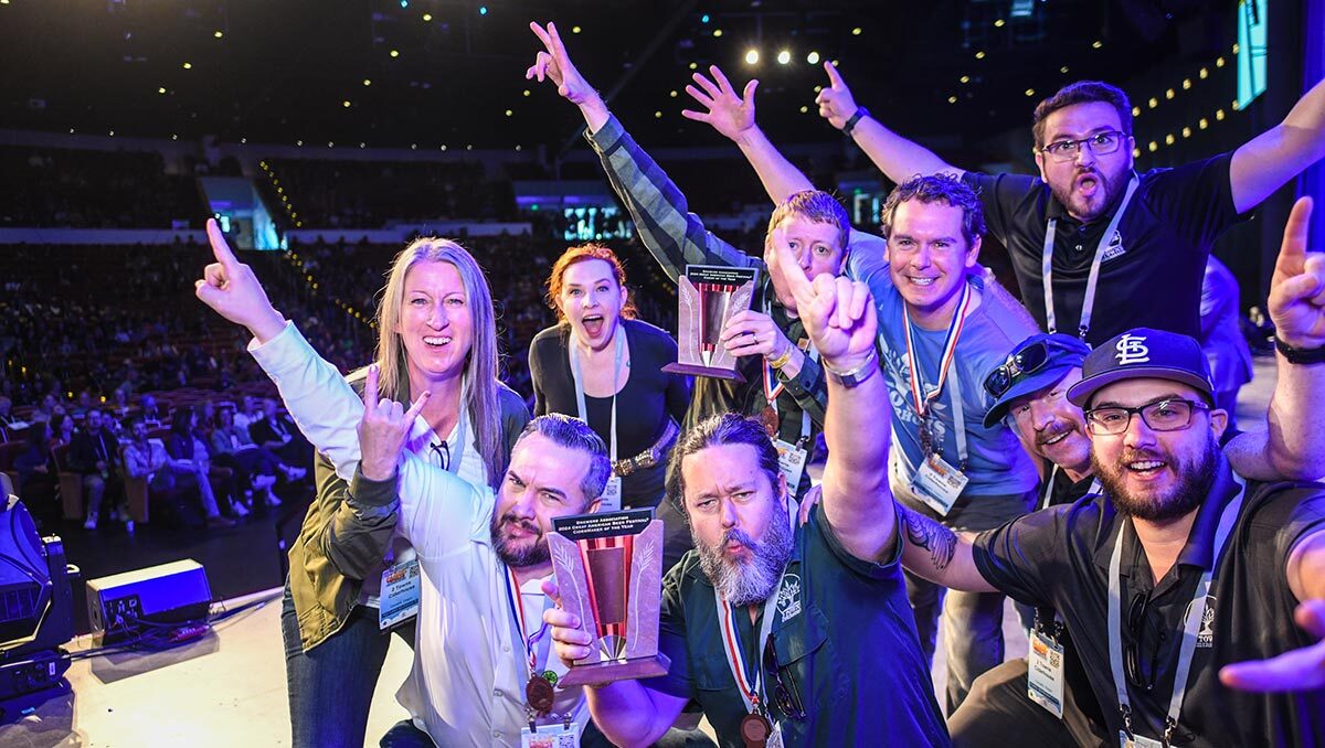 happy winners posing on GABF stage