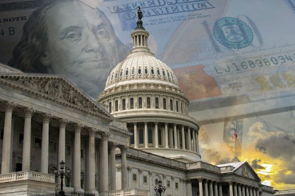 Exterior of the United States Capitol with money in background