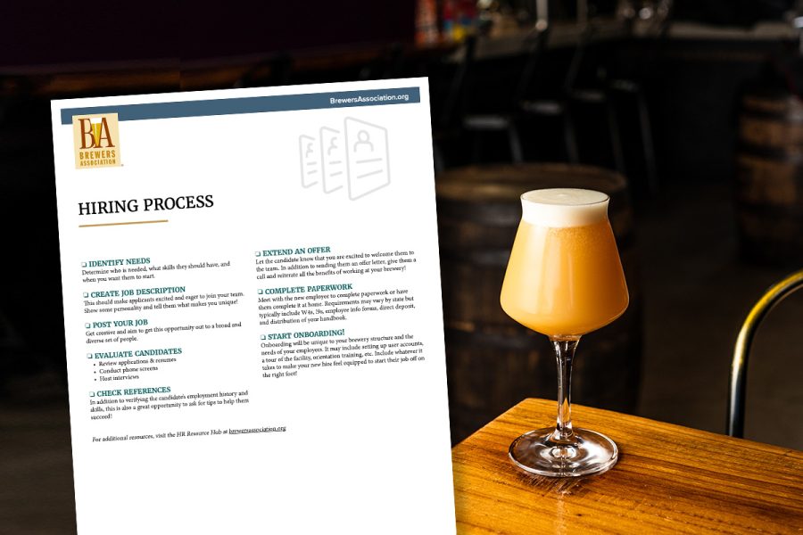 beer on table with human resources document overlaid