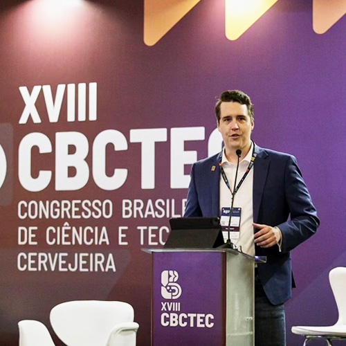 steve presenting at podium in brazil
