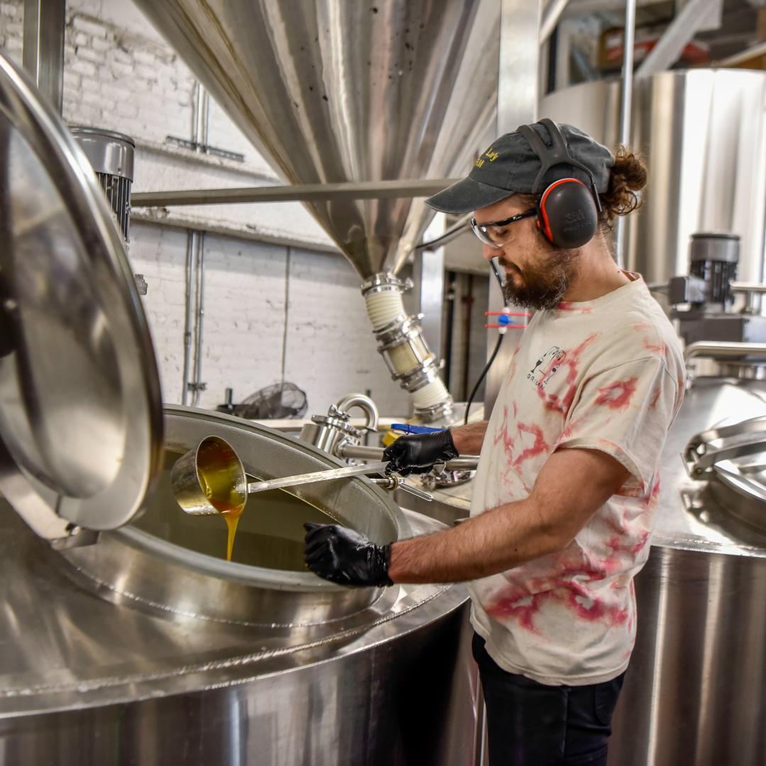 brewery worker with hearing protection