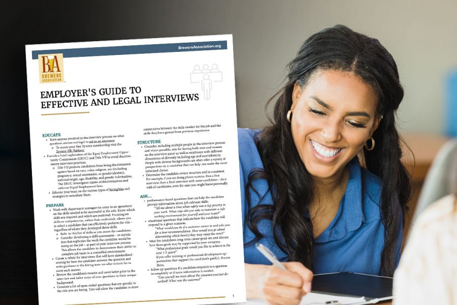 woman conducting interview with employee's guide resource cover