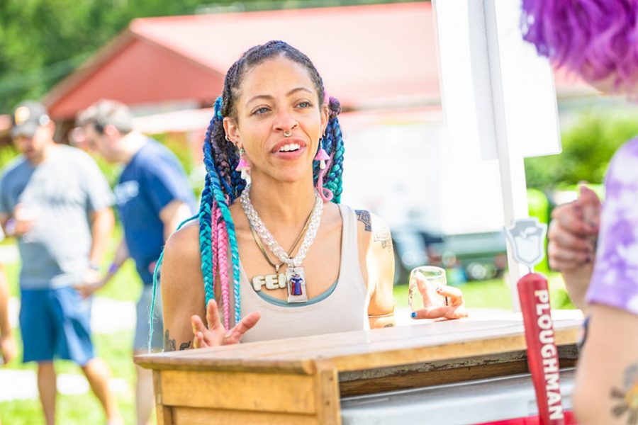 women ordering beer at outdoor beer tasting x